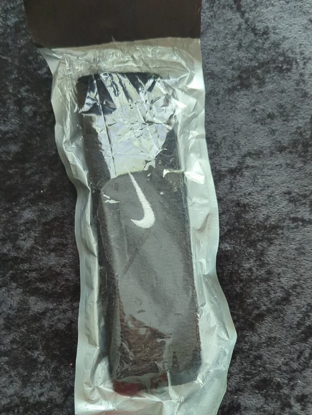 Nike Black Holster Clip with White Swoosh Logo